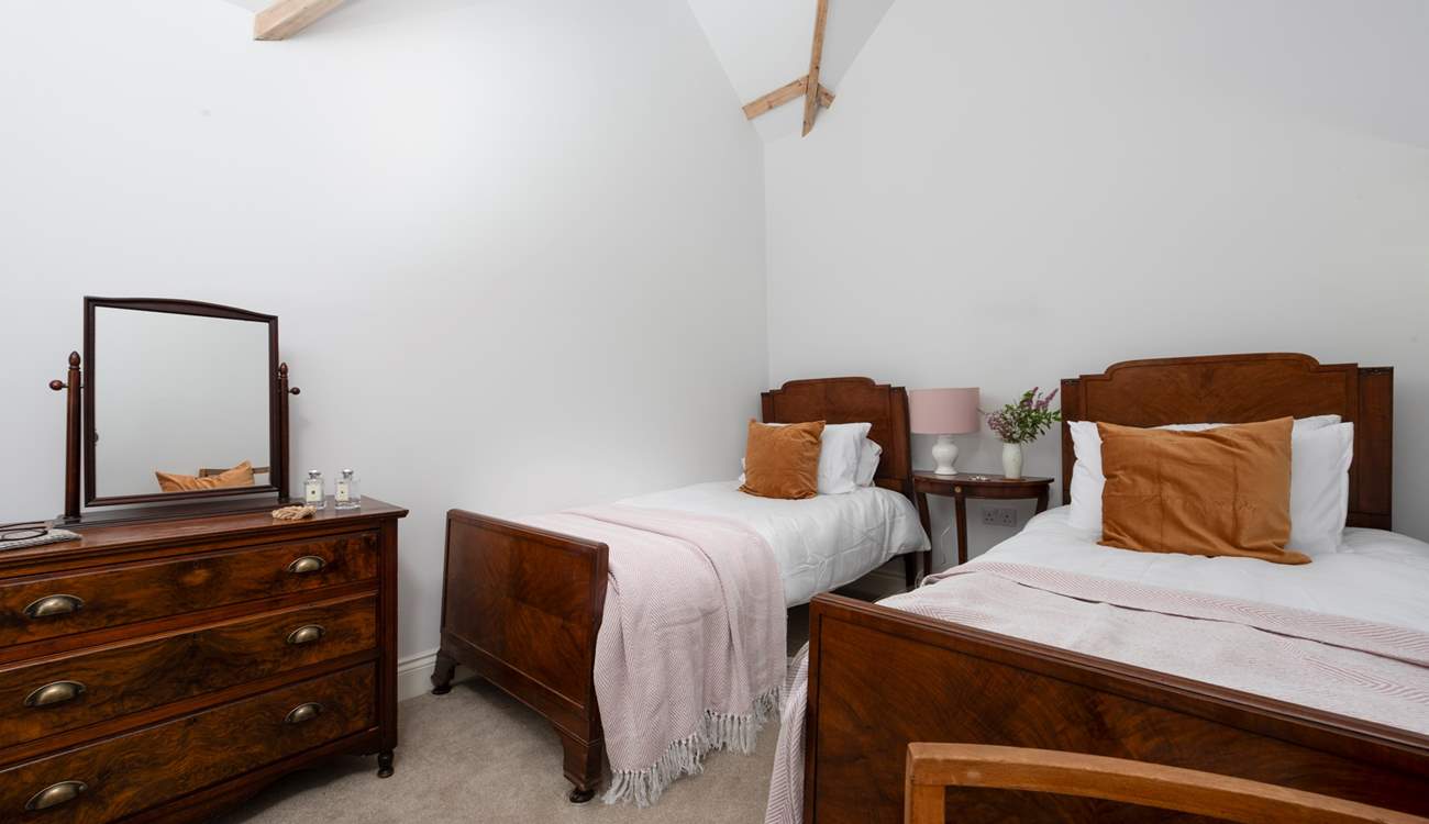 Twin beds are the order of the day in the third bedroom.