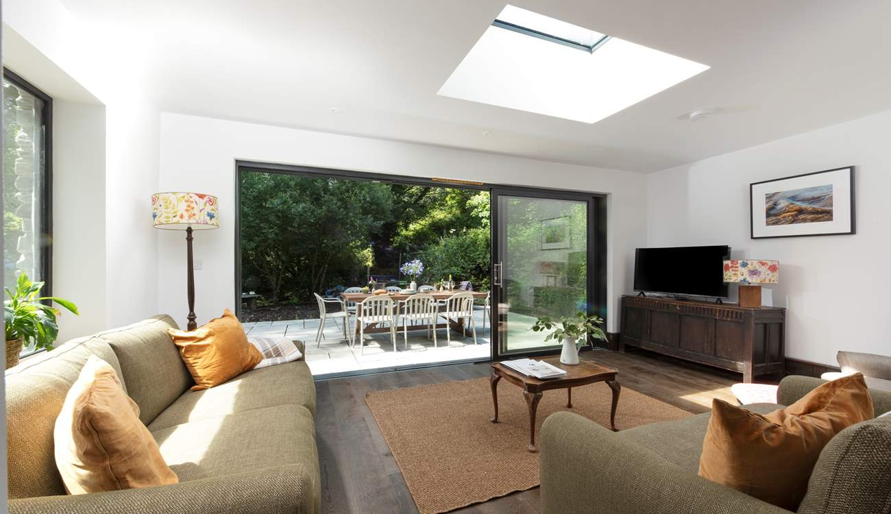 Huge sliding doors lead from the lounge out to the terrace.