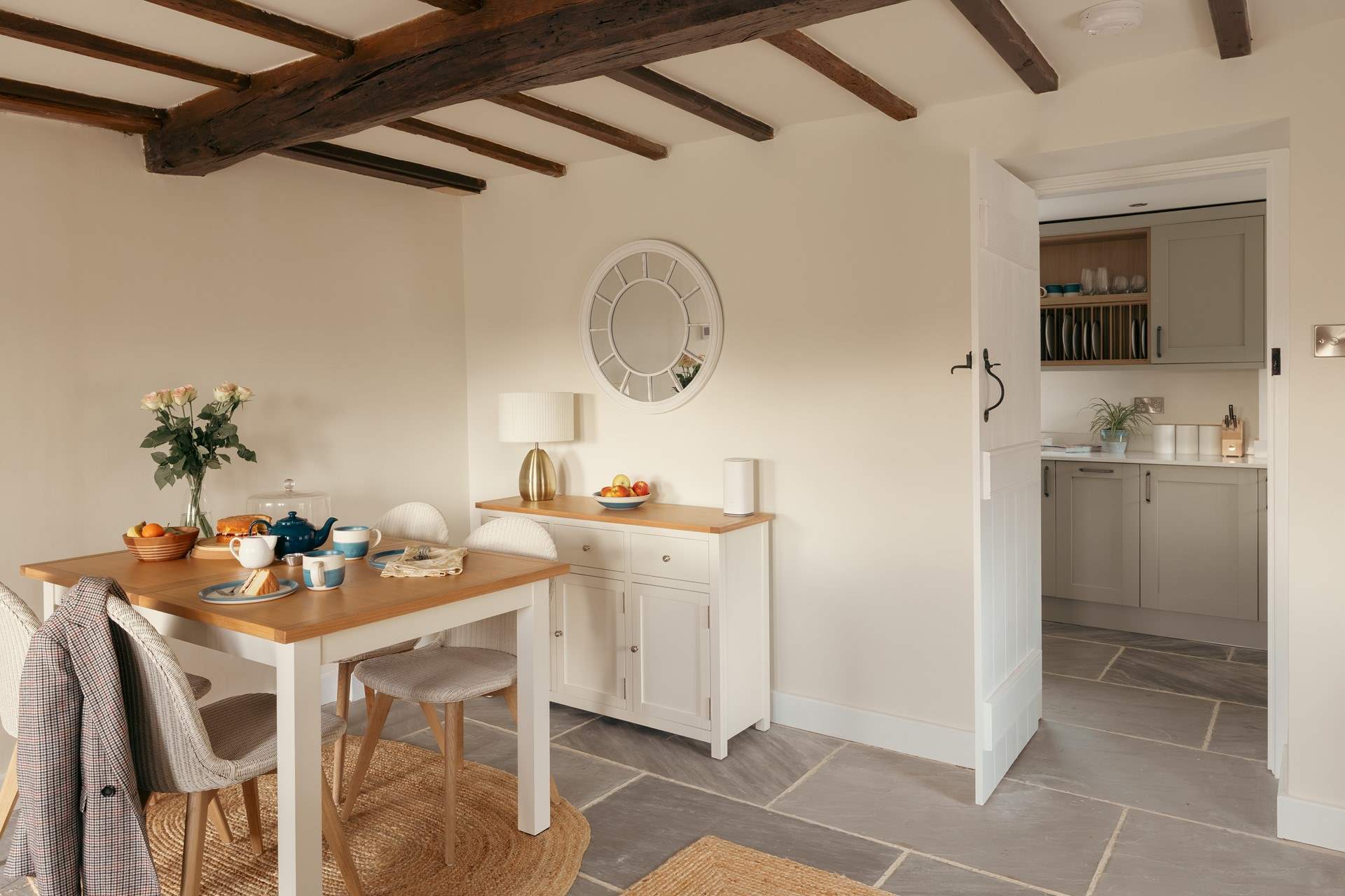 The charming dining-room is next to the kitchen. 