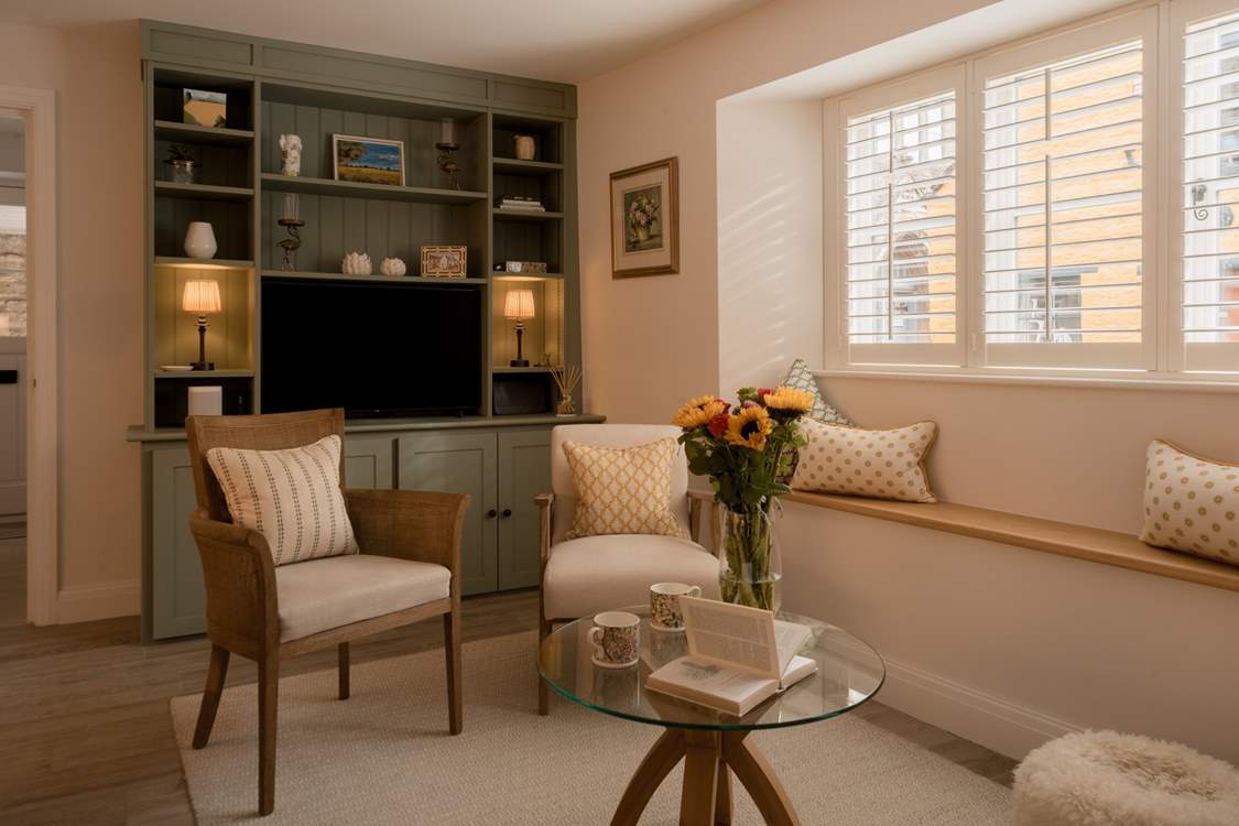 The large sitting-area is a real treat with comfy seating for four, under-floor heating and a Smart TV for cosy nights in.