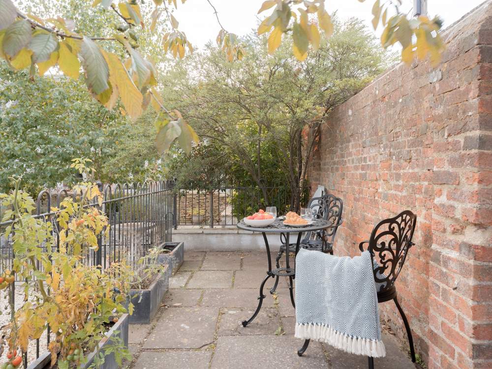 This sweet little private outdoor space is a rare find for such a centrally located property. A larger table is available to seat four.
