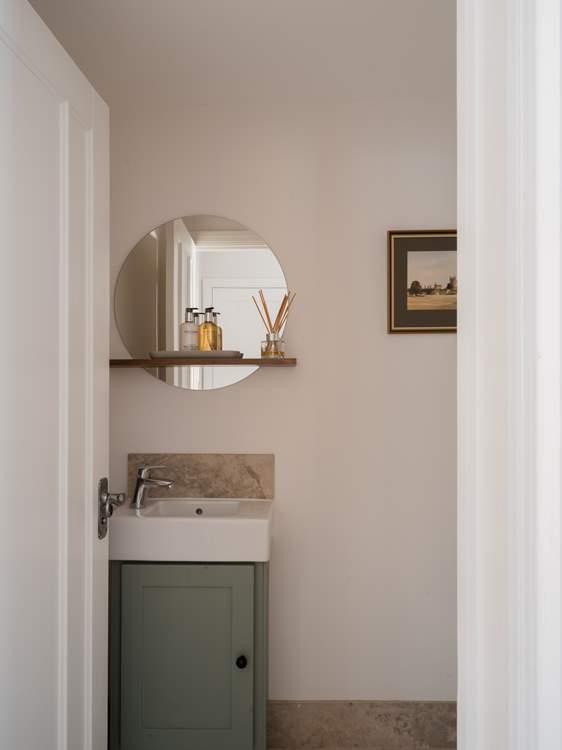 Outside the main living space you will find a handy and perfectly formed cloakroom.