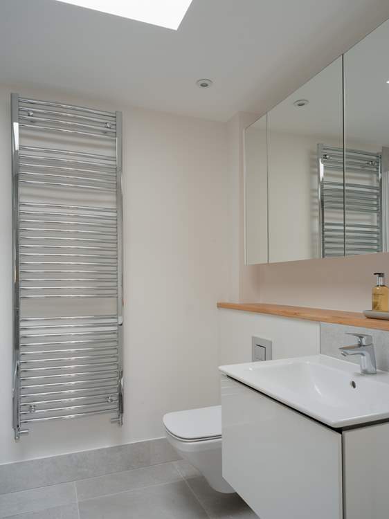 Sitting neatly between the two bedrooms is the generous family bathroom with luxury fixtures and fittings.