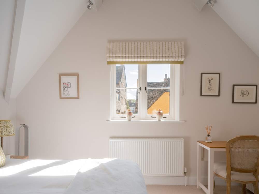 Bedroom 2 also features a lovely dressing-table with rooftop views over pretty Malmesbury.