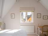 Bedroom 2 also features a lovely dressing-table with rooftop views over pretty Malmesbury.