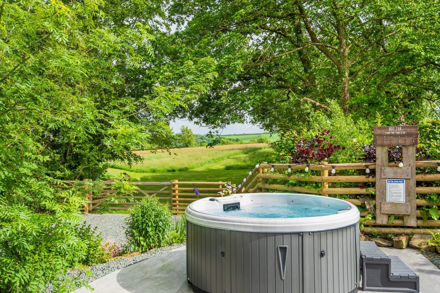 Take a dip in the hot tub surrounded by nature.