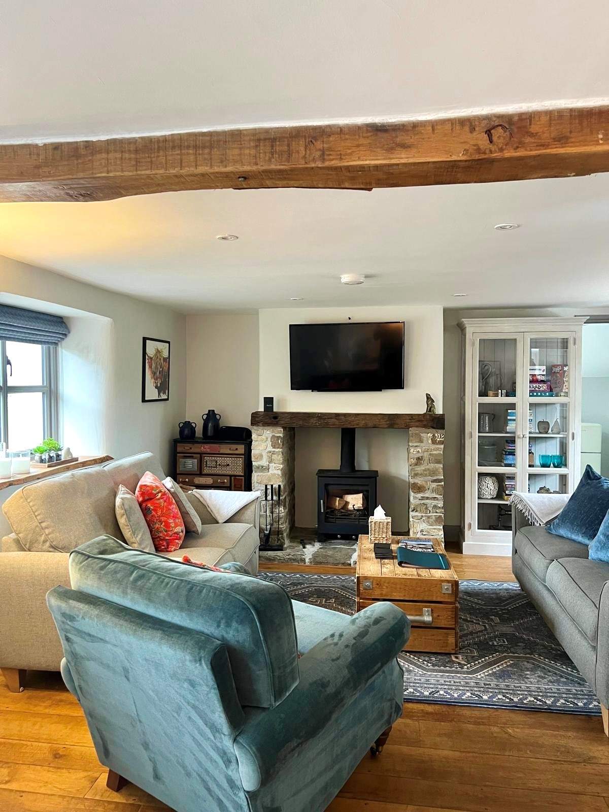 Cosy up in front of the wood-burner and watch a movie on the Smart TV. 