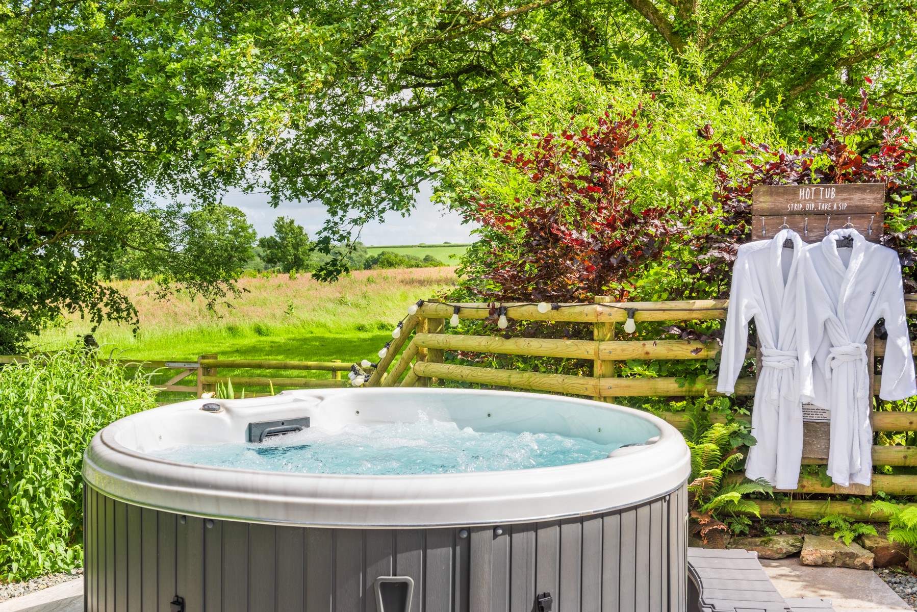 Take a dip in the hot tub surrounded by nature.