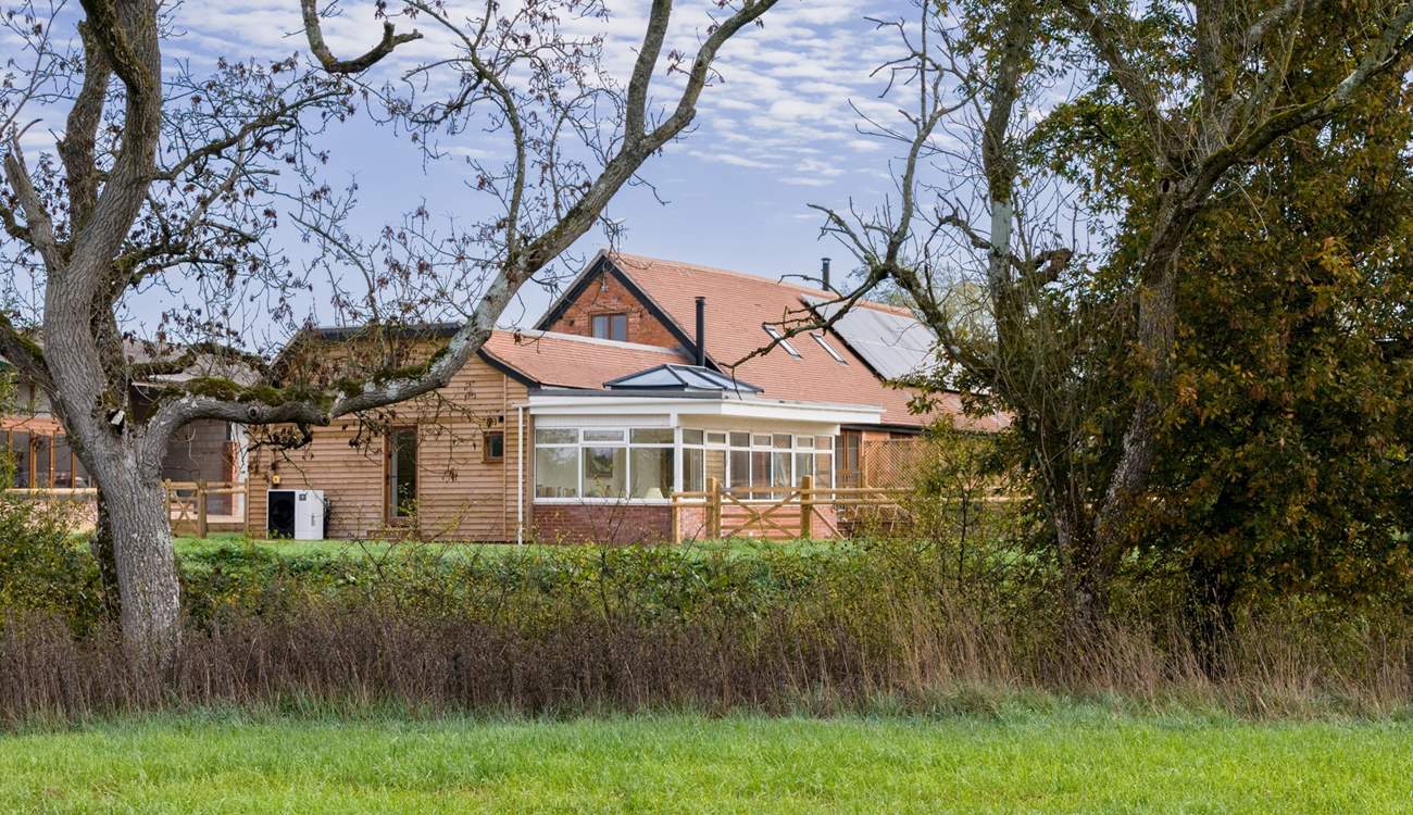 The property is at the end of of a small terrace of converted farm buildings and with its own private garden you will feel wonderfully tucked into the local landscape.