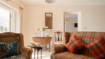 The living area is particularly lovely with scavenged furniture, a wonderful wood-burning stove and a cosy place to eat. Sit for a moment and feel the sense of calm, it's a real delight.