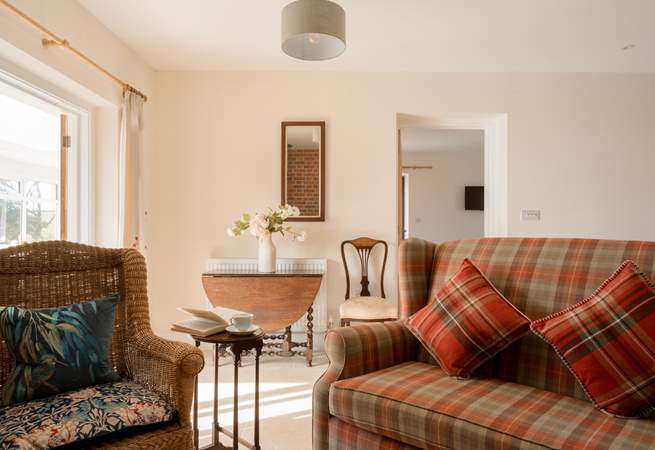 The living area is particularly lovely with scavenged furniture, a wonderful wood-burning stove and a cosy place to eat. Sit for a moment and feel the sense of calm, it's a real delight.