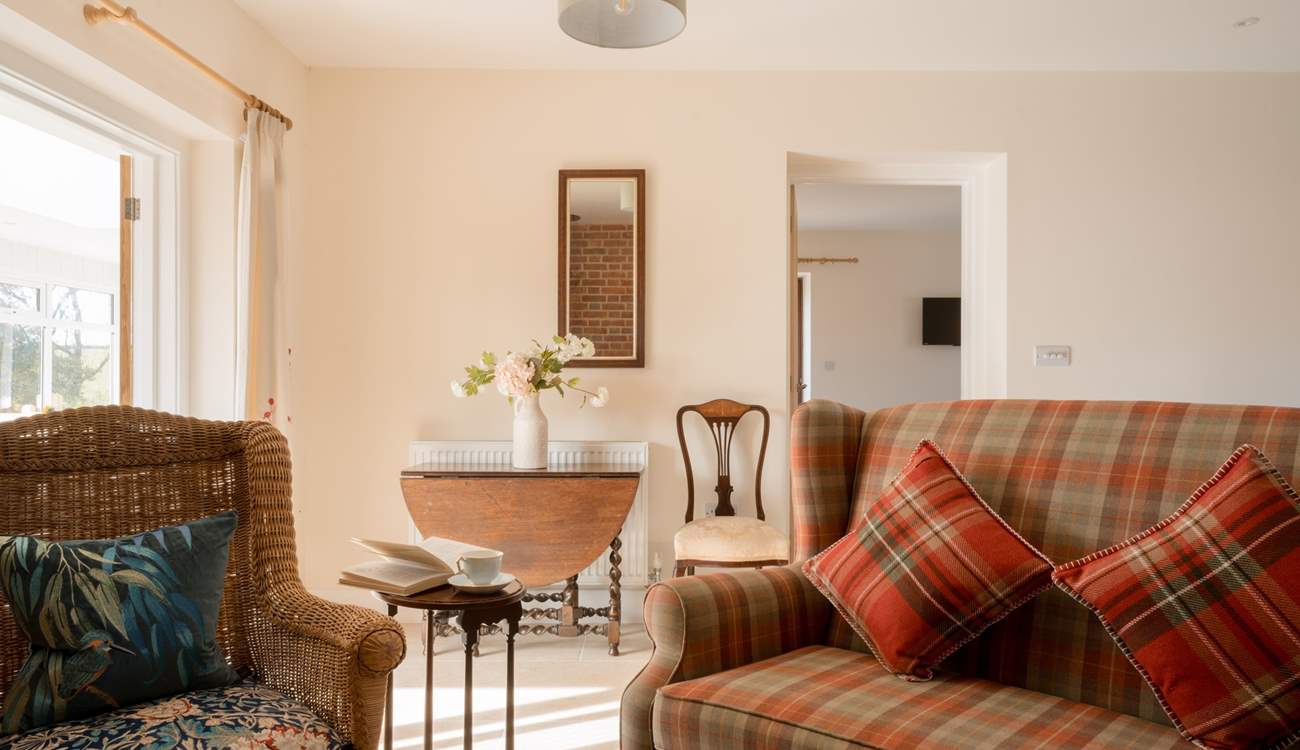 The living area is particularly lovely with scavenged furniture, a wonderful wood-burning stove and a cosy place to eat. Sit for a moment and feel the sense of calm, it's a real delight.