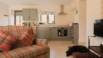 You enter into this stunning open plan kitchen/lounge/diner which is flooded with natural light. A wonderful place to relax and switch off. There is a door off the kitchen that connects to the owners' property, which will always remain locked. 