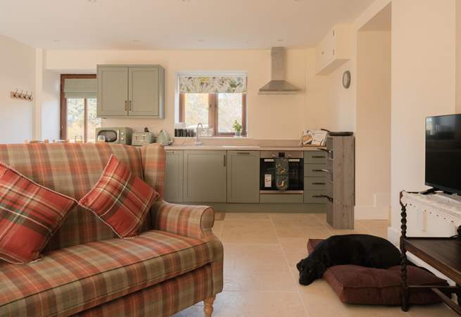 You enter into this stunning open plan kitchen/lounge/diner which is flooded with natural light. A wonderful place to relax and switch off. There is a door off the kitchen that connects to the owners' property, which will always remain locked. 