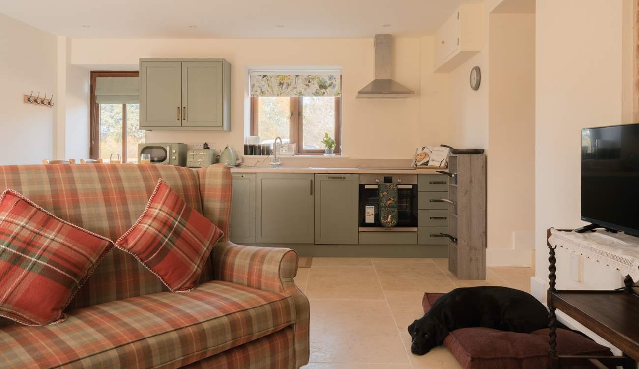 You enter into this stunning open plan kitchen/lounge/diner which is flooded with natural light. A wonderful place to relax and switch off. There is a door off the kitchen that connects to the owners' property, which will always remain locked. 