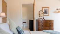 Plenty of storage and a wonderful en suite shower-room.