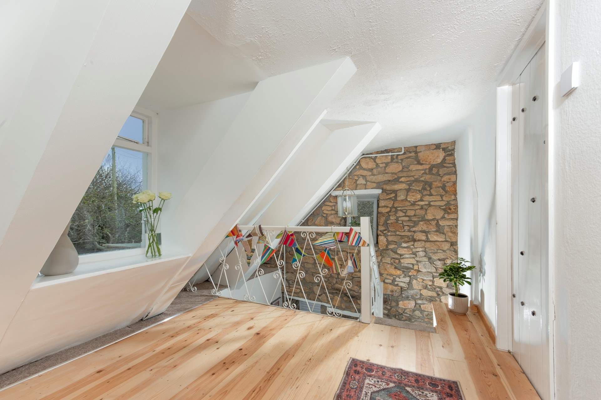 Take care on the narrow steps and sloping eaves on the first floor.