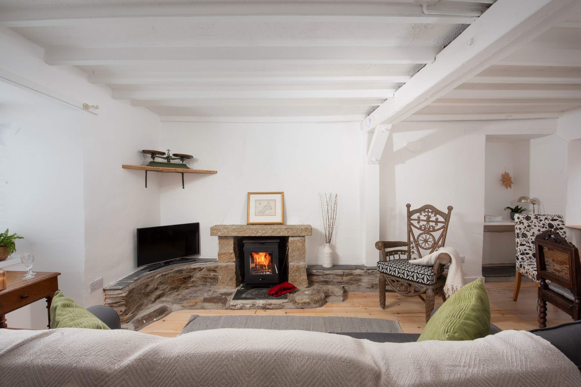 The wood-burner is perfect for sitting by with a good book.