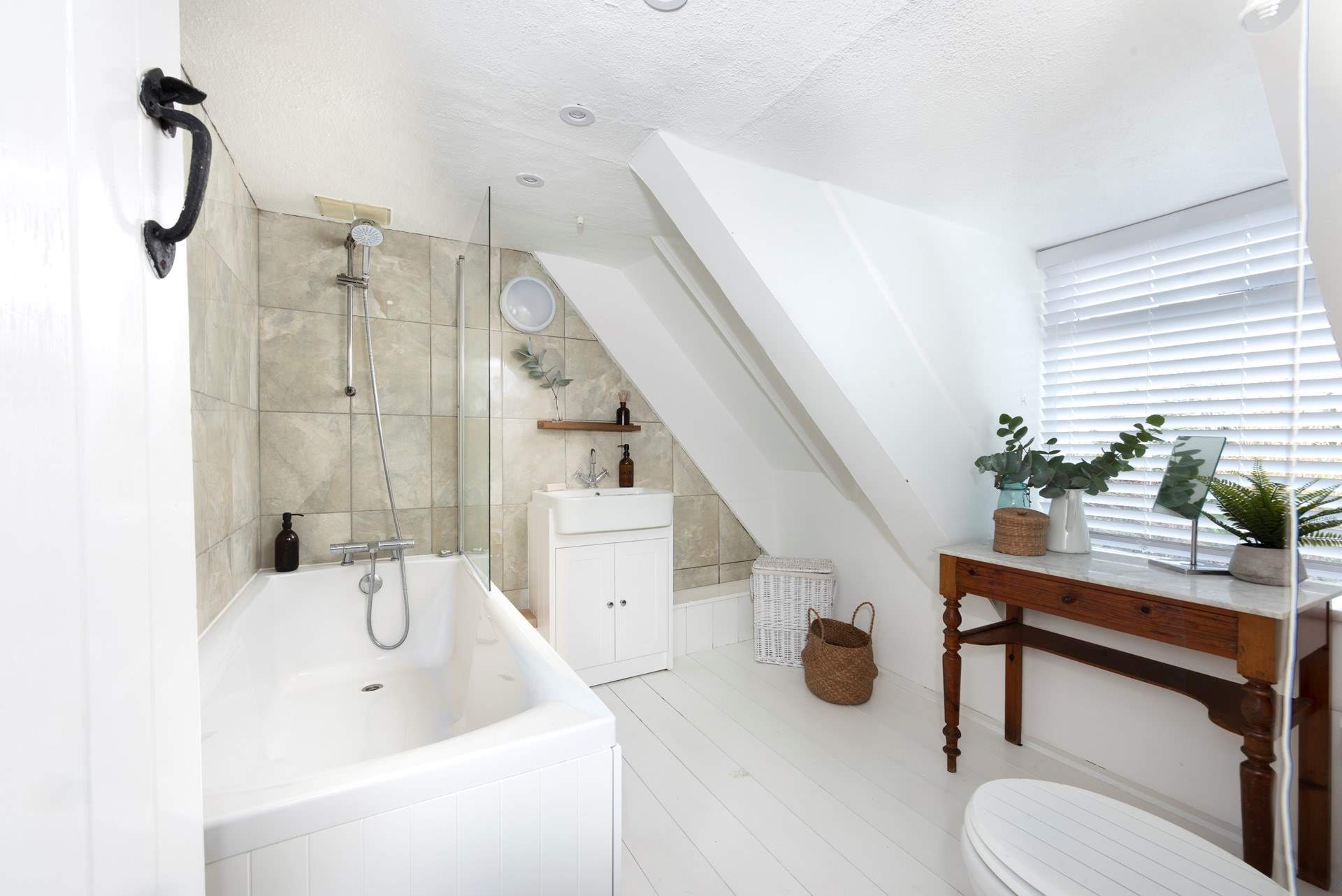 The family bathroom is at the end of the hall.