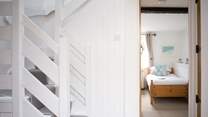 Head upstairs to bedroom 2 and the family bathroom.