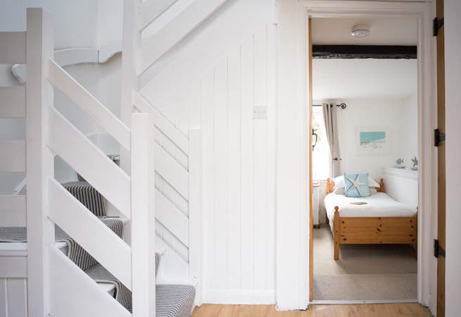 Head upstairs to bedroom 2 and the family bathroom.