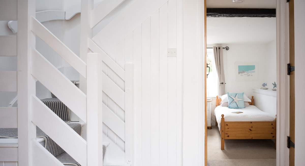 Head upstairs to bedroom 2 and the family bathroom.