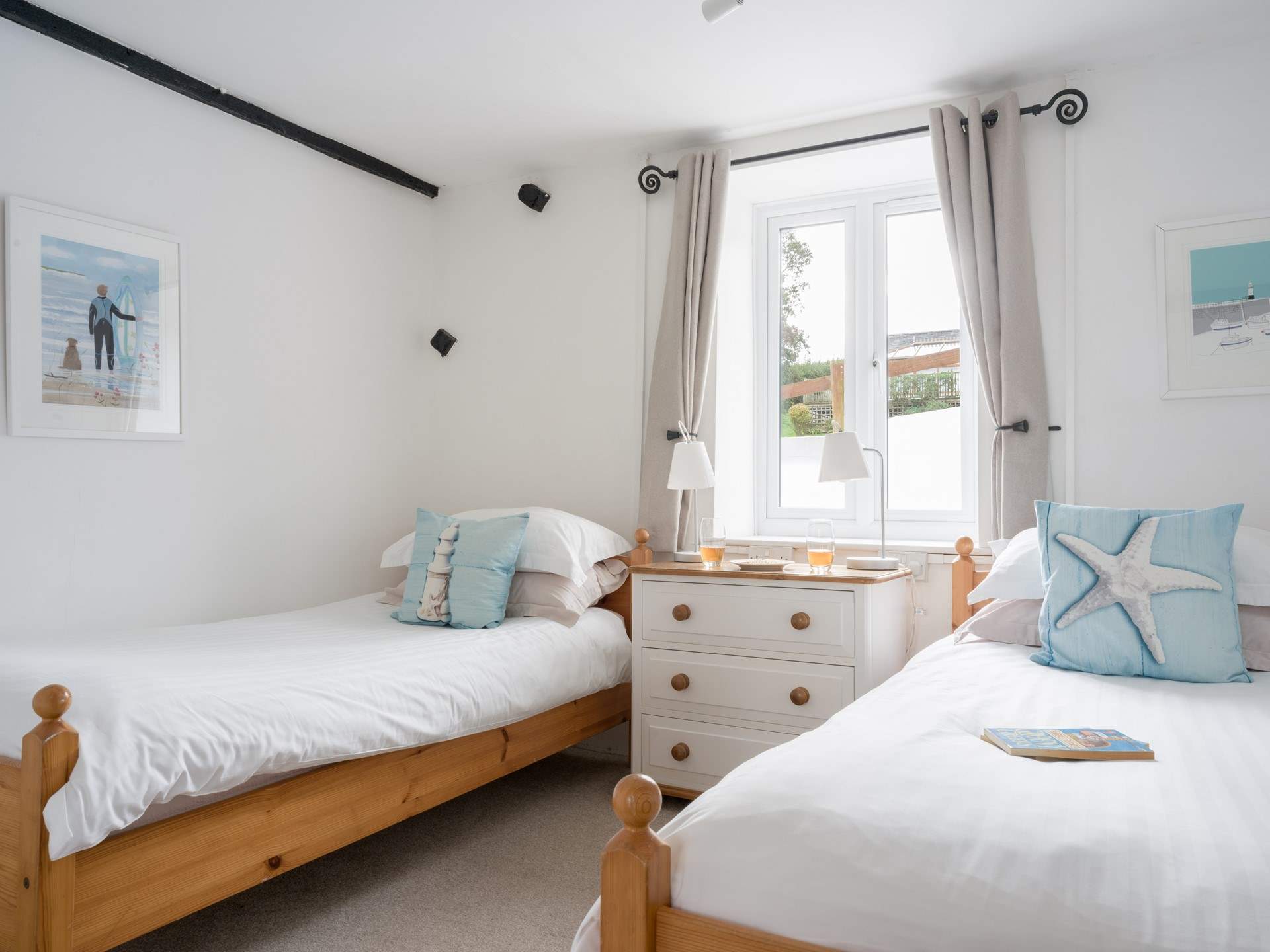 Bedroom 1 on the ground floor has twin beds suitable for adults or children.