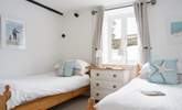 Bedroom 1 on the ground floor has twin beds suitable for adults or children. - Thumbnail Image