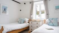 Bedroom 1 on the ground floor has twin beds suitable for adults or children.