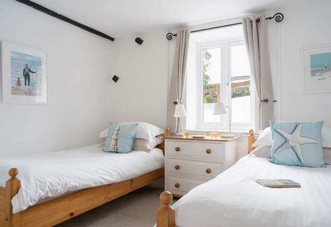Bedroom 1 on the ground floor has twin beds suitable for adults or children.