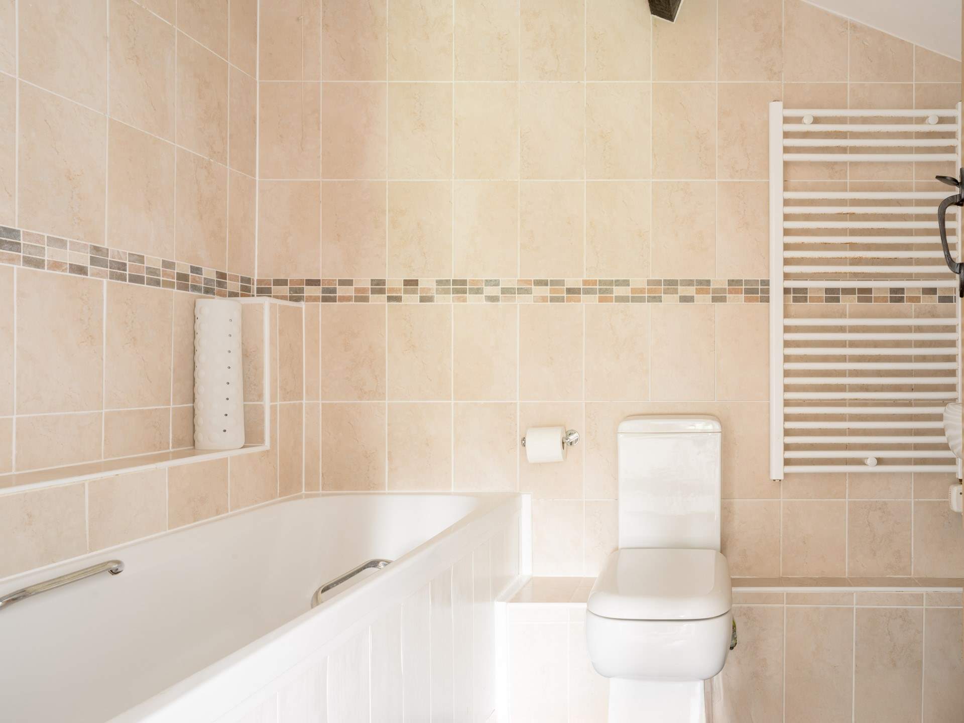 Start the day with a refreshing shower in the family bathroom.