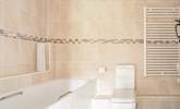 Start the day with a refreshing shower in the family bathroom. - Thumbnail Image