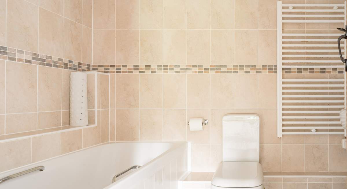 Start the day with a refreshing shower in the family bathroom.