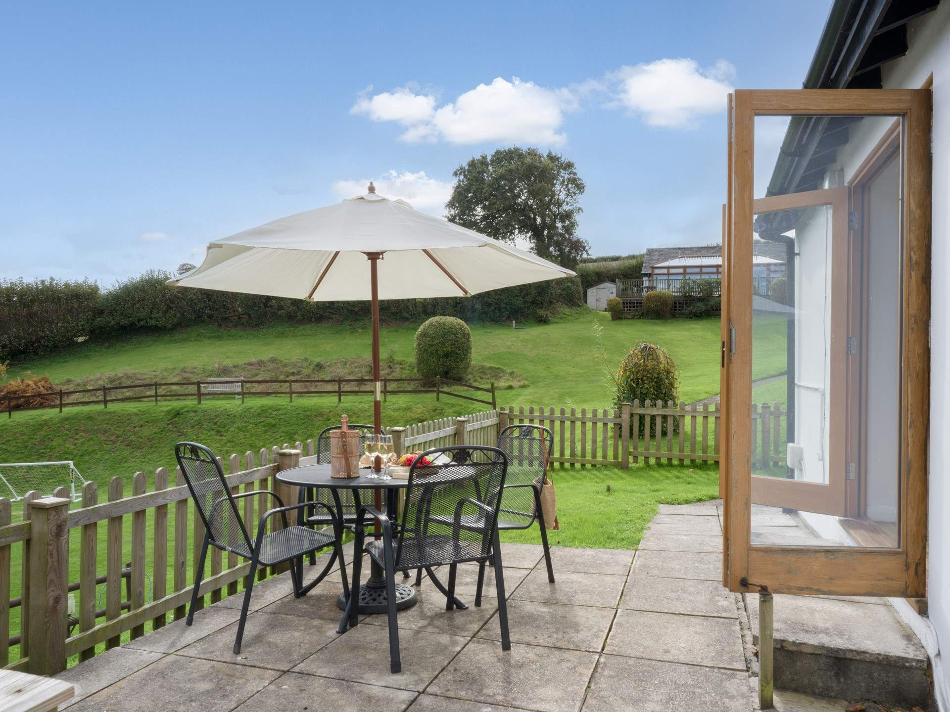 The patio area is the perfect spot for dining al fresco.