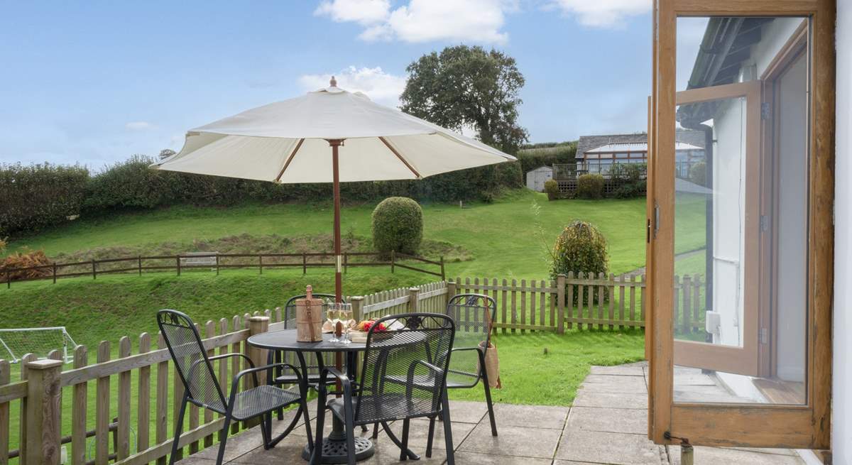 The patio area is the perfect spot for dining al fresco.
