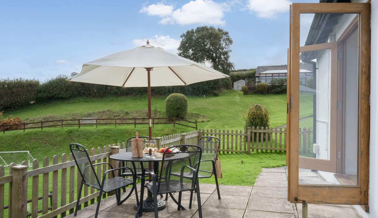 The patio area is the perfect spot for dining al fresco.