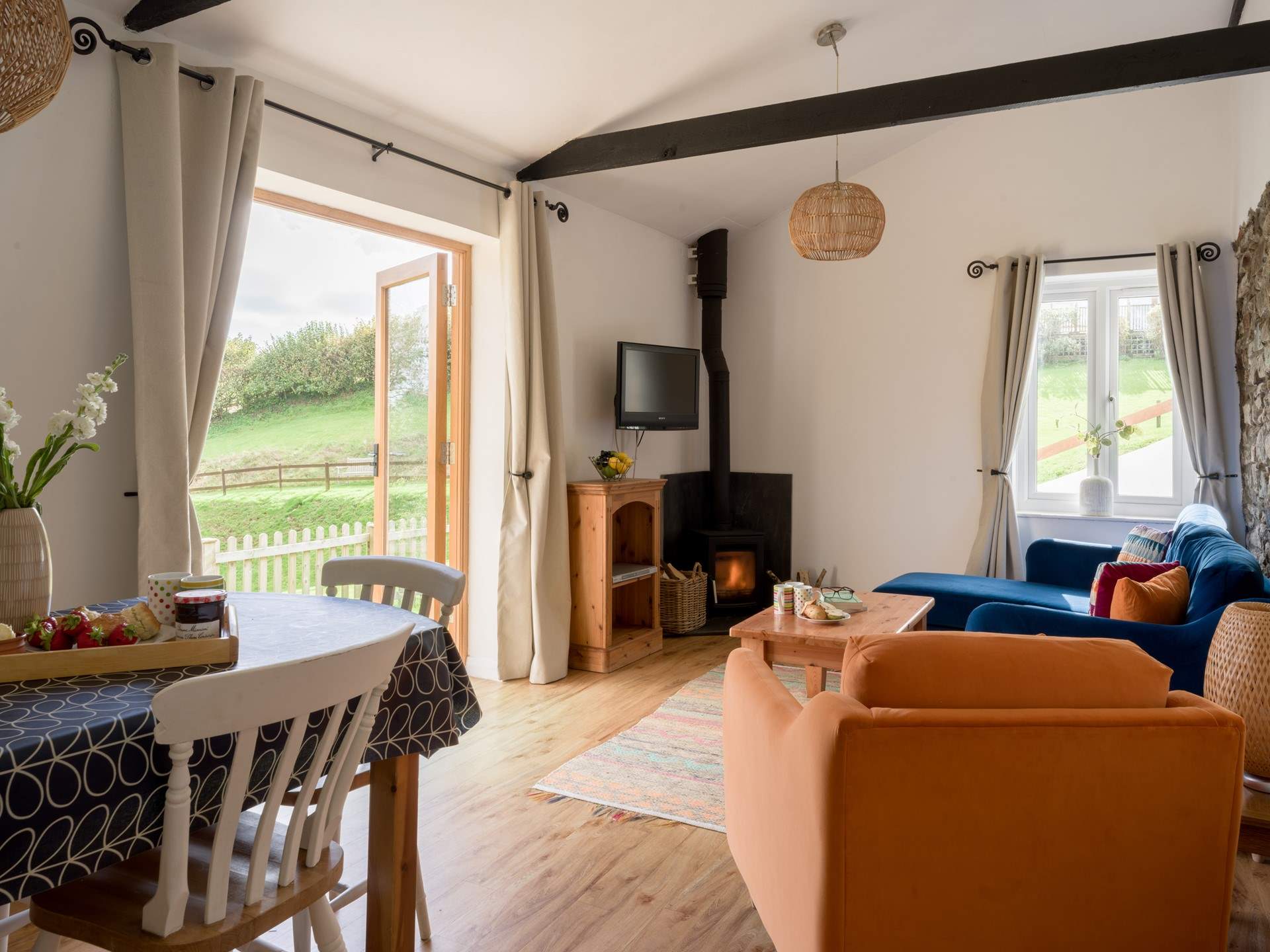 Welcome to Wren Cottage. On those chillier days light the wood-burner and cosy up in front of the TV.