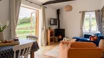 Welcome to Wren Cottage. On those chillier days light the wood-burner and cosy up in front of the TV.