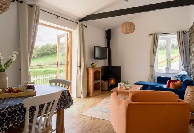 Welcome to Wren Cottage. On those chillier days light the wood-burner and cosy up in front of the TV.