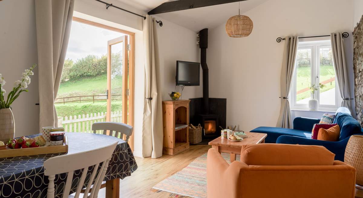 Welcome to Wren Cottage. On those chillier days light the wood-burner and cosy up in front of the TV.