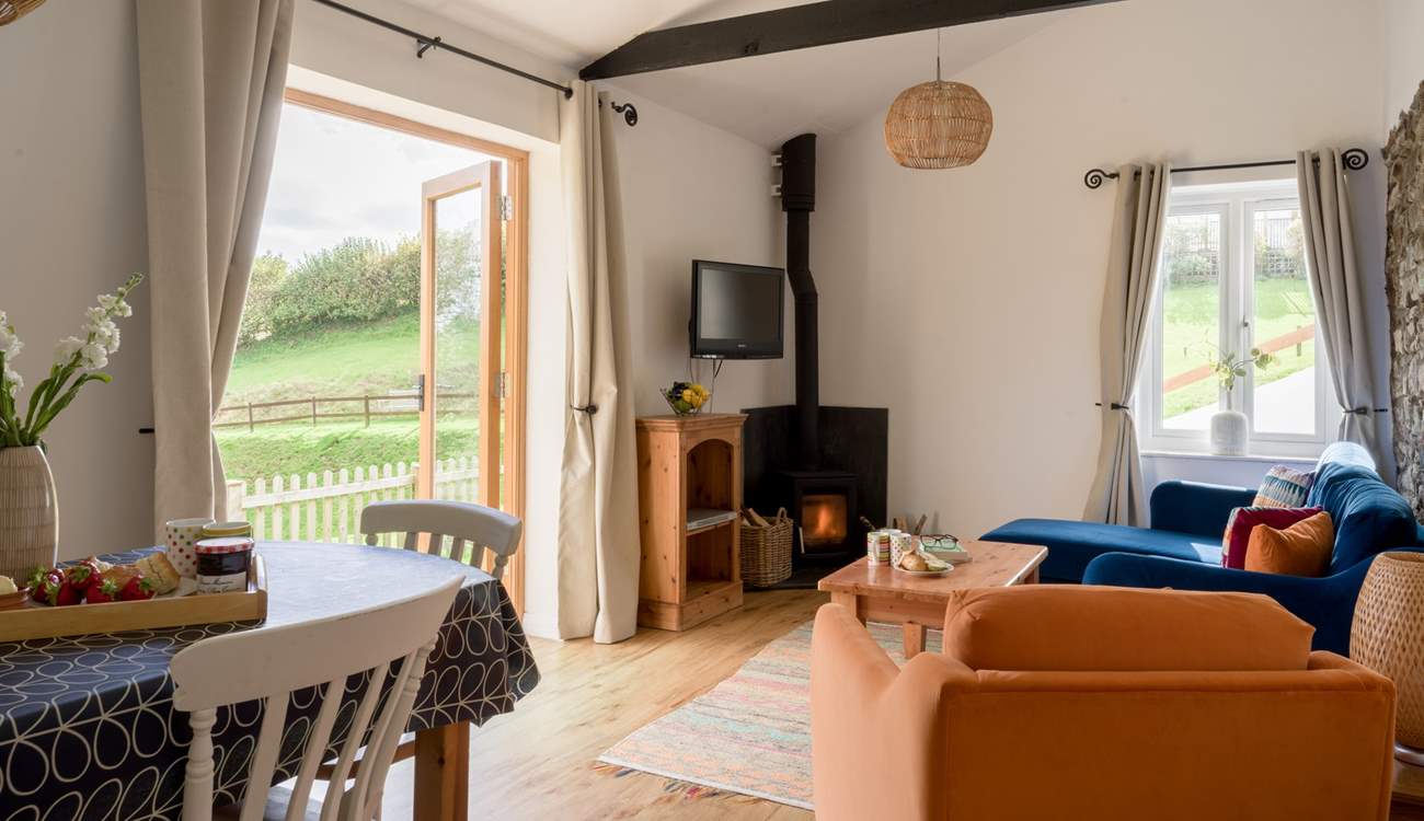 Welcome to Wren Cottage. On those chillier days light the wood-burner and cosy up in front of the TV.