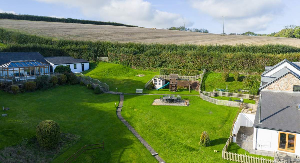 Head out of the gate and follow the path to the swimming pool and games-room.