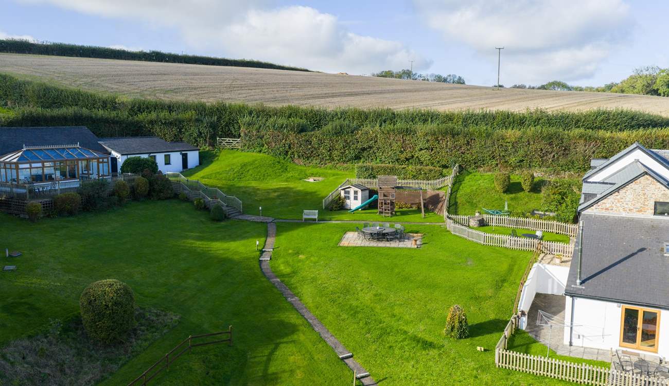 Head out of the gate and follow the path to the swimming pool and games-room.