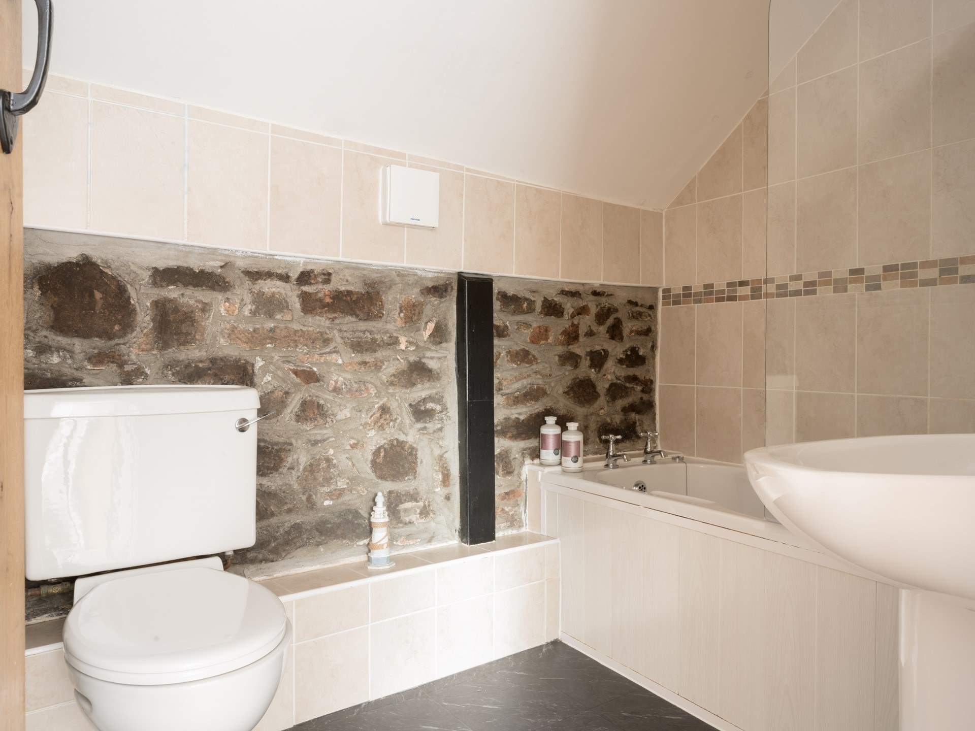 Rinse off those sandy toes in the family bathroom.