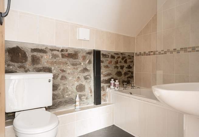 Rinse off those sandy toes in the family bathroom.