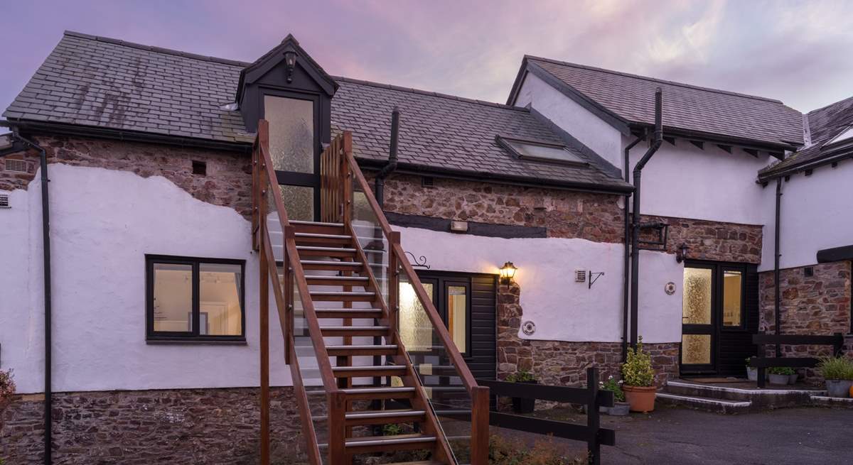 Climb the stairs to Swallow Cottage and enjoy the peaceful setting.