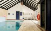 The heated indoor swimming pool is available to book for hour long exclusive sessions. - Thumbnail Image