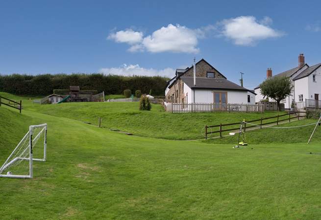 The children will love the large communal play area whilst the adults will be able to keep an eye from the top window of Swallow Cottage.