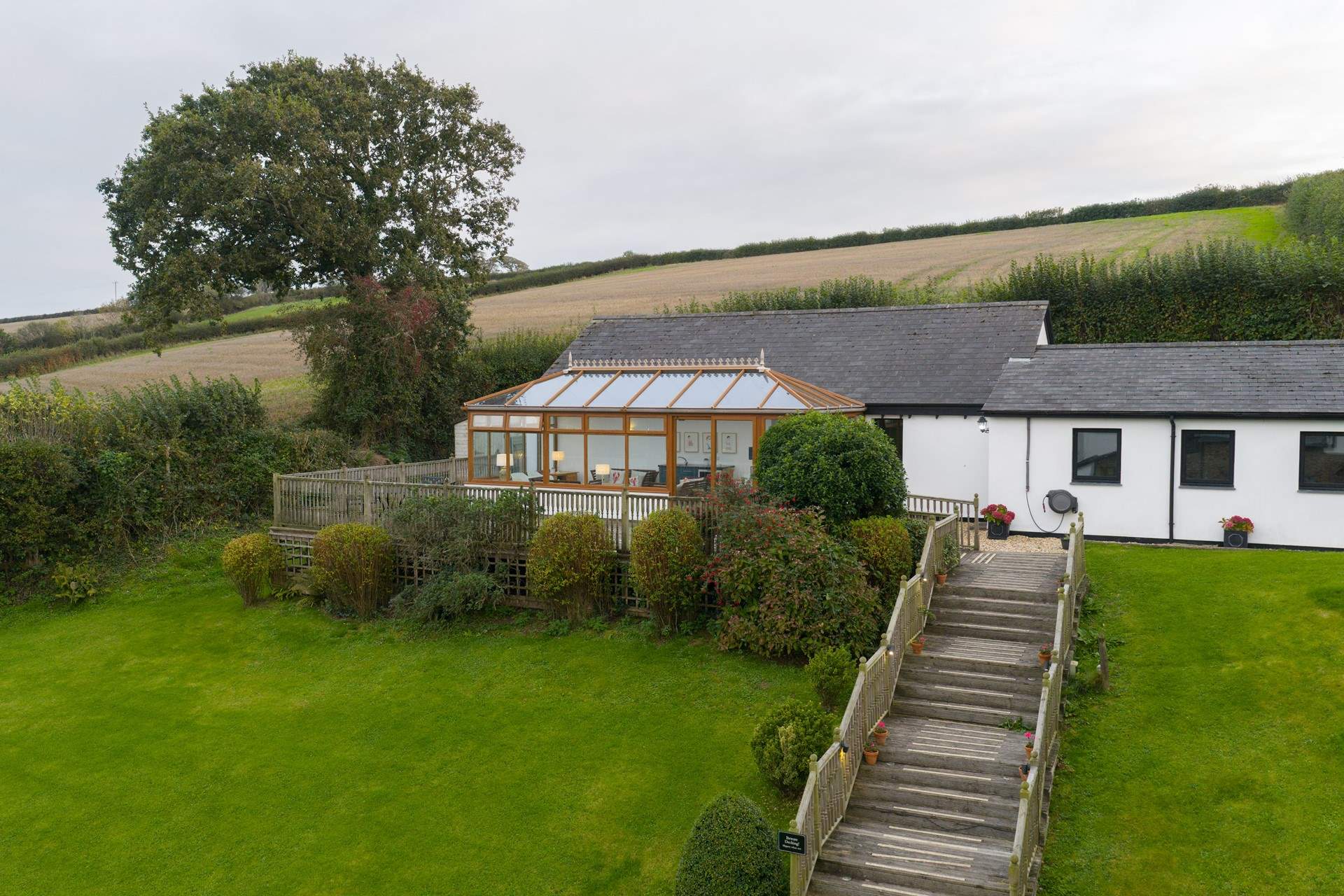 Take the steps up to the swimming pool and games-room.