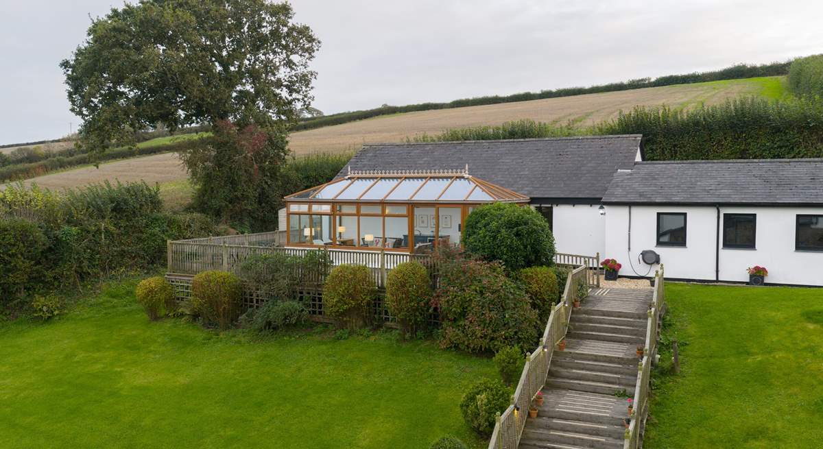 Take the steps up to the swimming pool and games-room.